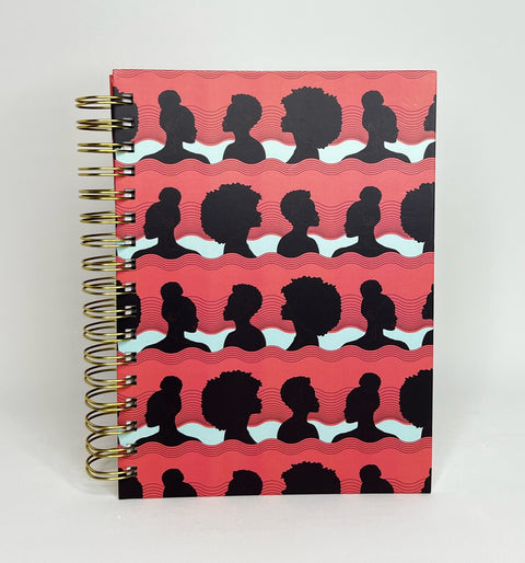 Spiral notebook with silhouettes of African American Women in Positive Peach color