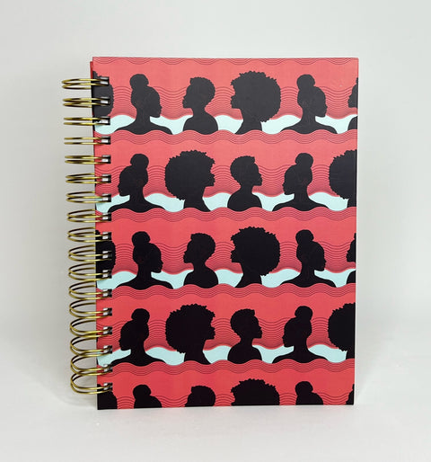 Spiral notebook with silhouettes of African American Women in Positive Peach color   