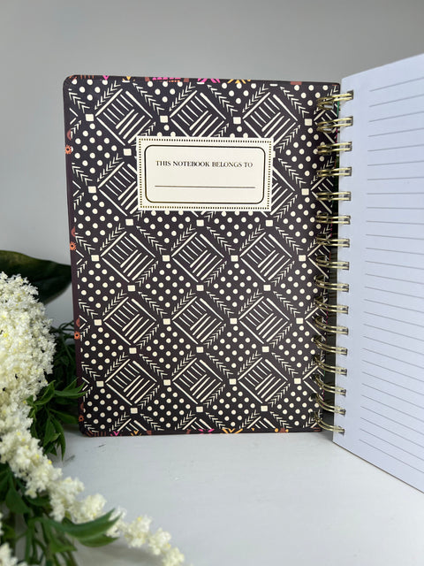 Inside notebook cover featuring "This notebook belongs to" label
